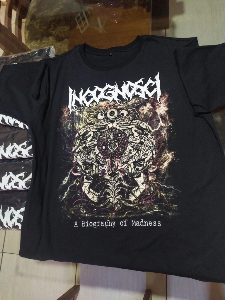 Camiseta IncognoscI - A Biography Of Madness (Oficial)